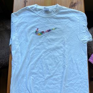 Floral Embroidered Nike Swoosh tshirt